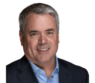 A headshot of Brendon Mills