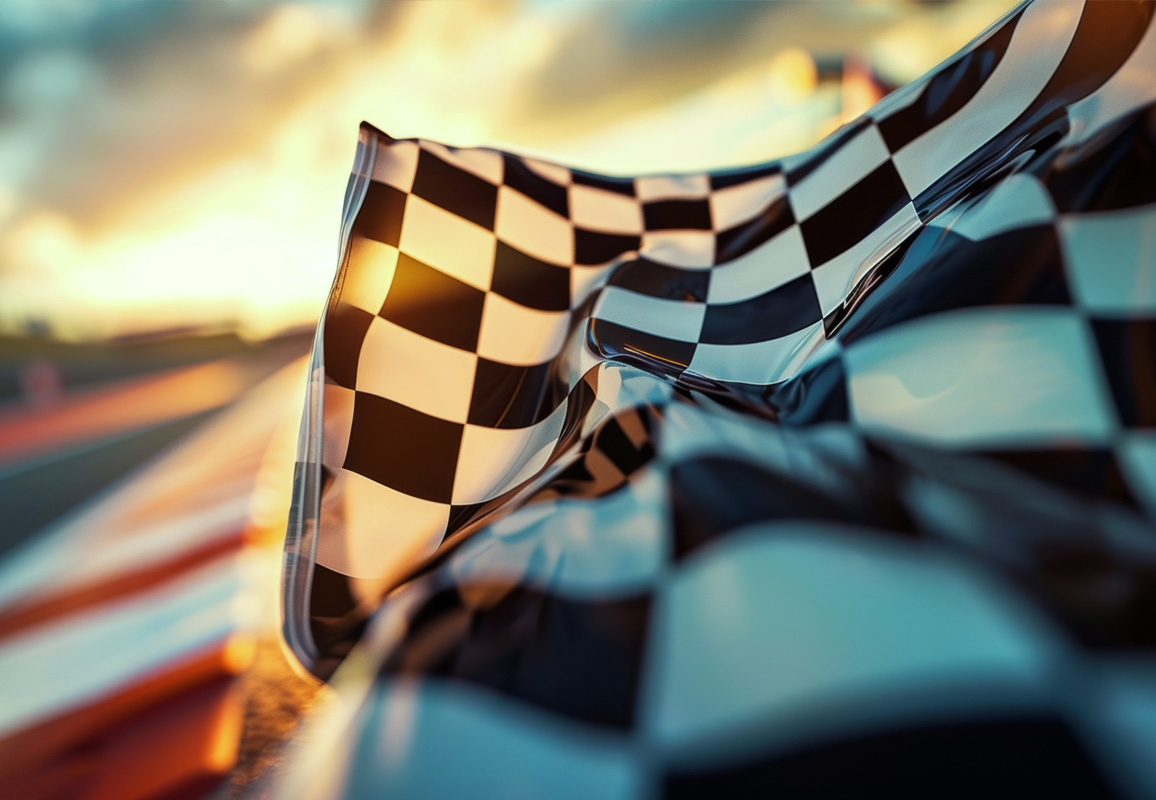 A closeup of a checkered flag being waved